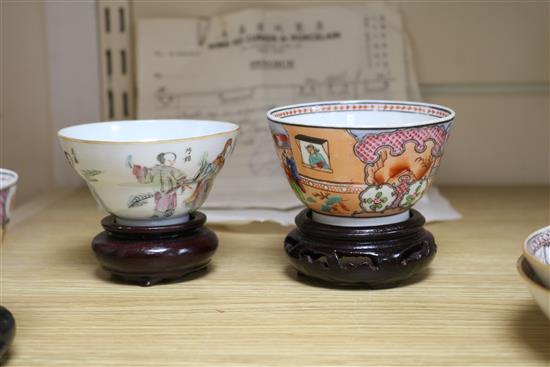 Three 18th century Chinese family rose tea bowls and two saucers, two other teabowls and three wood stands